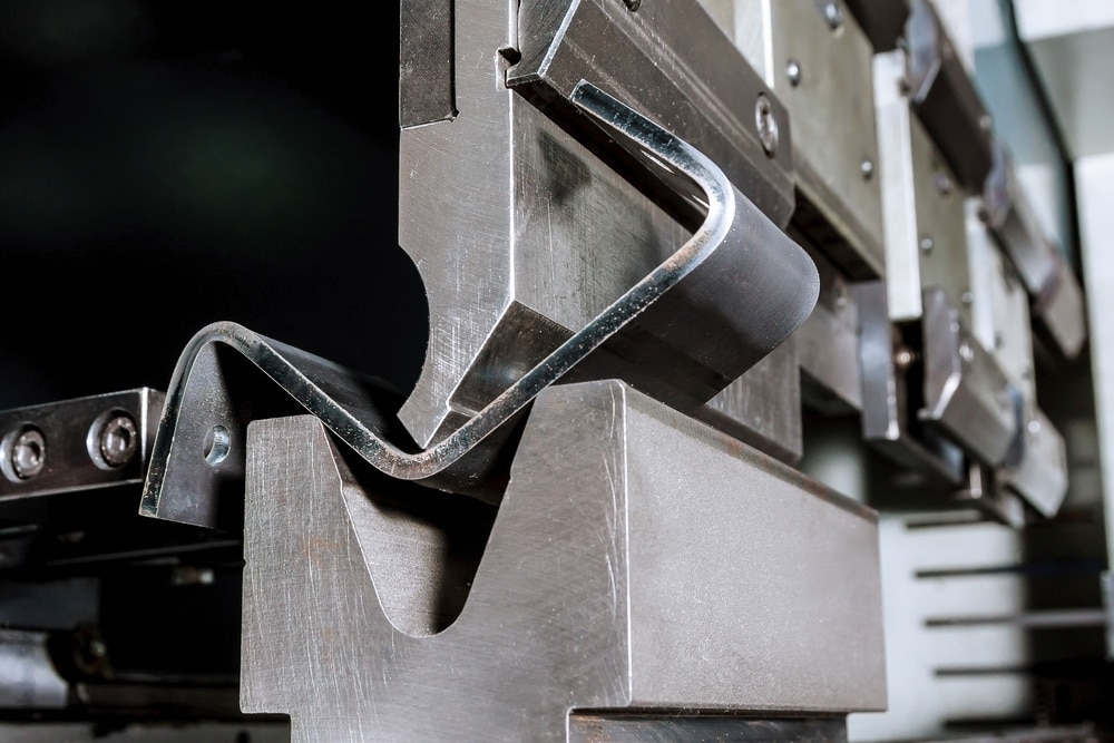 CNC bending press bending a sheet metal bracket
