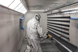 painter spray painting sheet metal parts